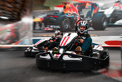 go karts racing on the track